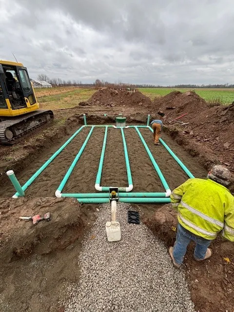Sam Long crew installing septic leach field pipes on Grand Island NY